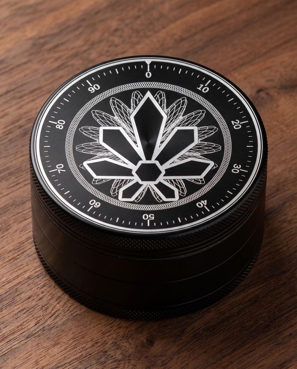 Black grinder with the dial laser engraved on the lid